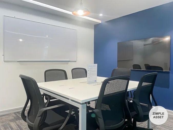 picture Office for rent with modern coworking space, Blue Chips Thonglor Building. Inside is a modern lobby that opens up to a contemporary office space. - 6/9