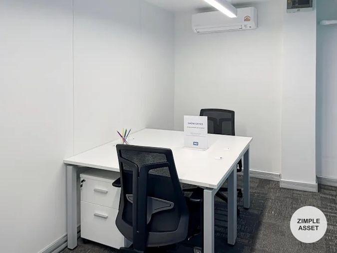 picture Office for rent with modern coworking space, Blue Chips Thonglor Building. Inside is a modern lobby that opens up to a contemporary office space. - 9/9