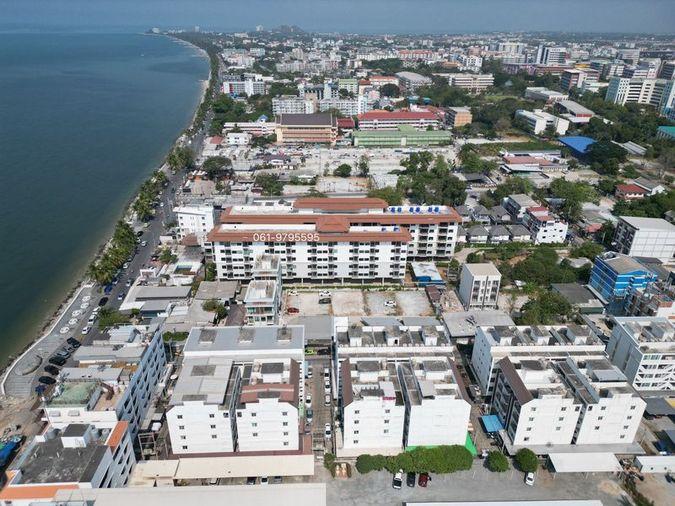 picture Beachfront land for sale in Bang Saen, prime location, with existing structures. - 5/5