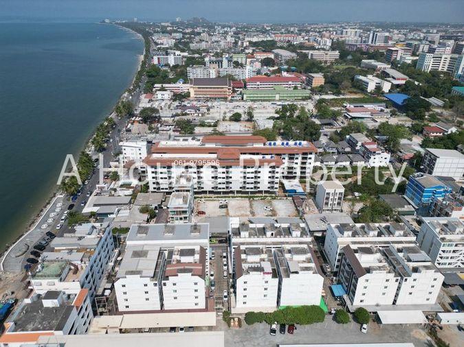 picture Beachfront land for sale in Bang Saen, prime location, with existing structures. - 5/5