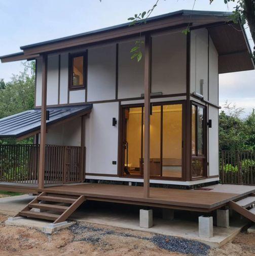 picture Prefabricated modular homes for sale. Loft style, balcony, and includes a pet house. Construction services available nationwide. - 4/15