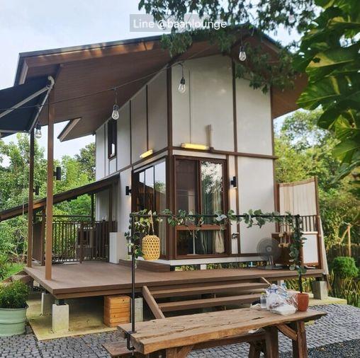 picture Prefabricated modular homes for sale. Loft style, balcony, and includes a pet house. Construction services available nationwide. - 4/15
