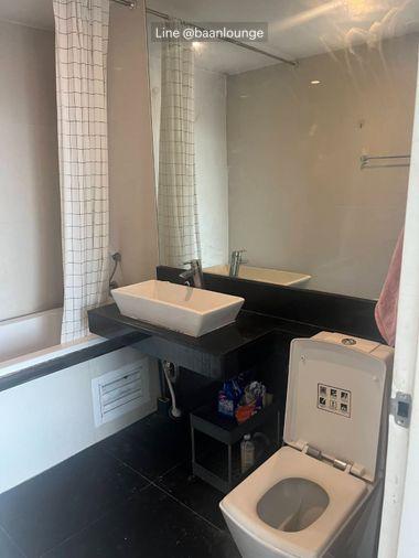 picture Two-story duplex with 2 bedrooms and 2 bathrooms at Bangkok Horizon Sathorn - Narathiwas. Features a bathtub. - 12/13