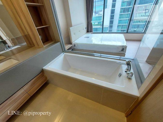 รูป คอนโดหรูทำเลทองในอโศกให้เช่า 1 ห้องนอน 1 ห้องน้ำ พร้อมอ่างอาบน้ำ พร้อมเข้าอยู่ ทิศเหนืออากาศเย็นสบาย - รูปที่ 8/23